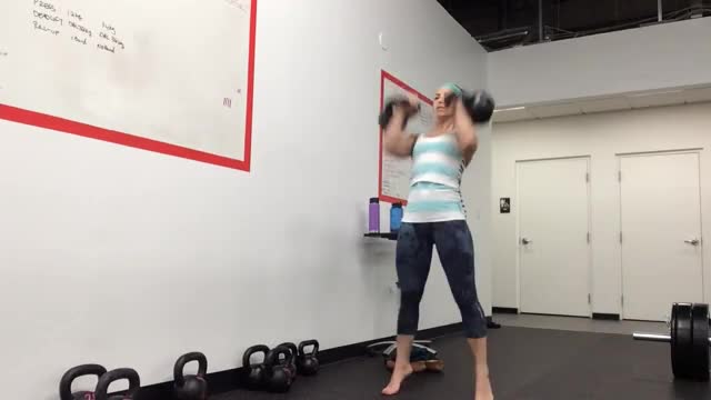 Female Two-Arm Kettlebell Jerk demonstration