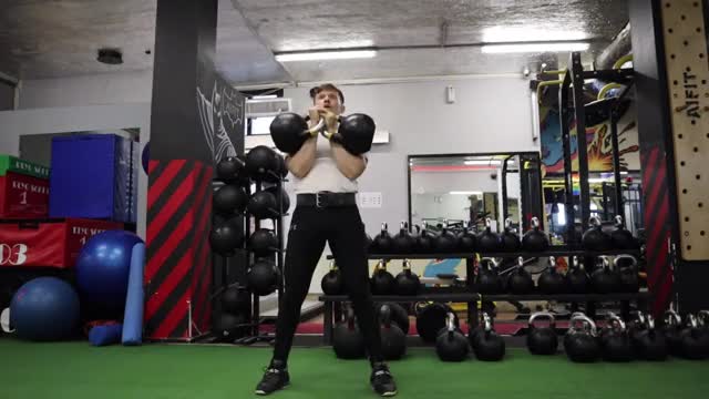 Male Two-Arm Kettlebell Jerk demonstration